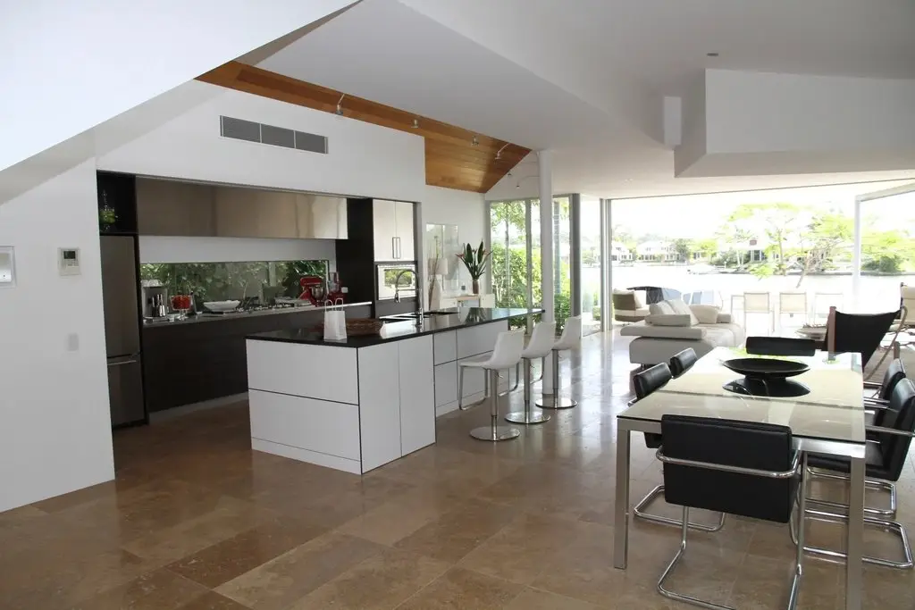 Open kitchen shelving styled with dishware and a basket