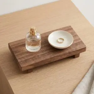 Brown paulownia wood bathroom tray used as a farmhouse-style soap dish riser