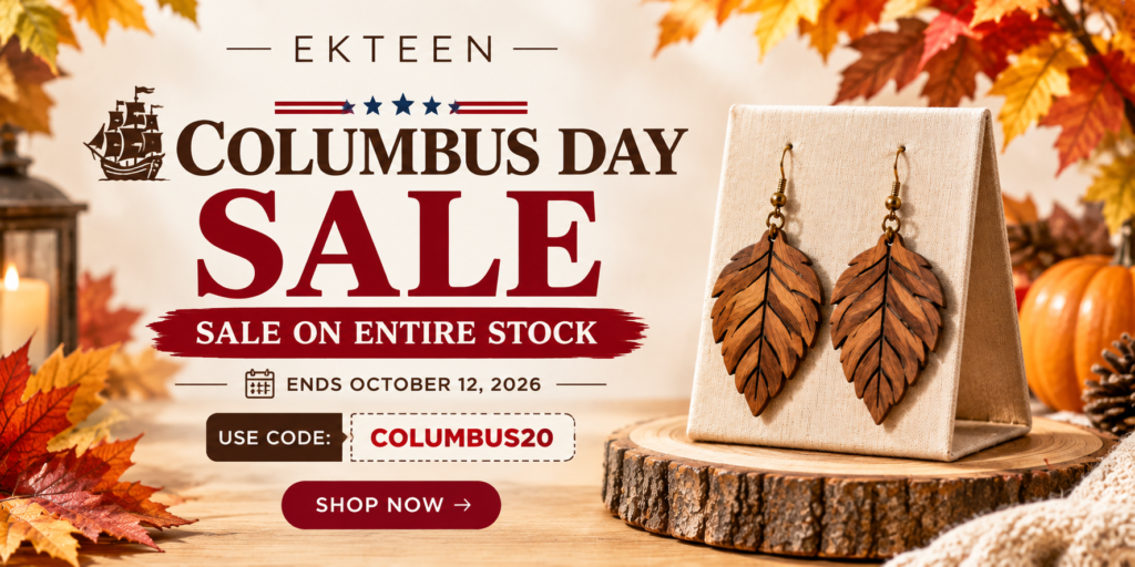 Ekteen Columbus Day Sale banner featuring wooden leaf earrings on a display stand, surrounded by autumn leaves and warm seasonal décor, with text announcing a sale on entire stock through October 12, 2026.